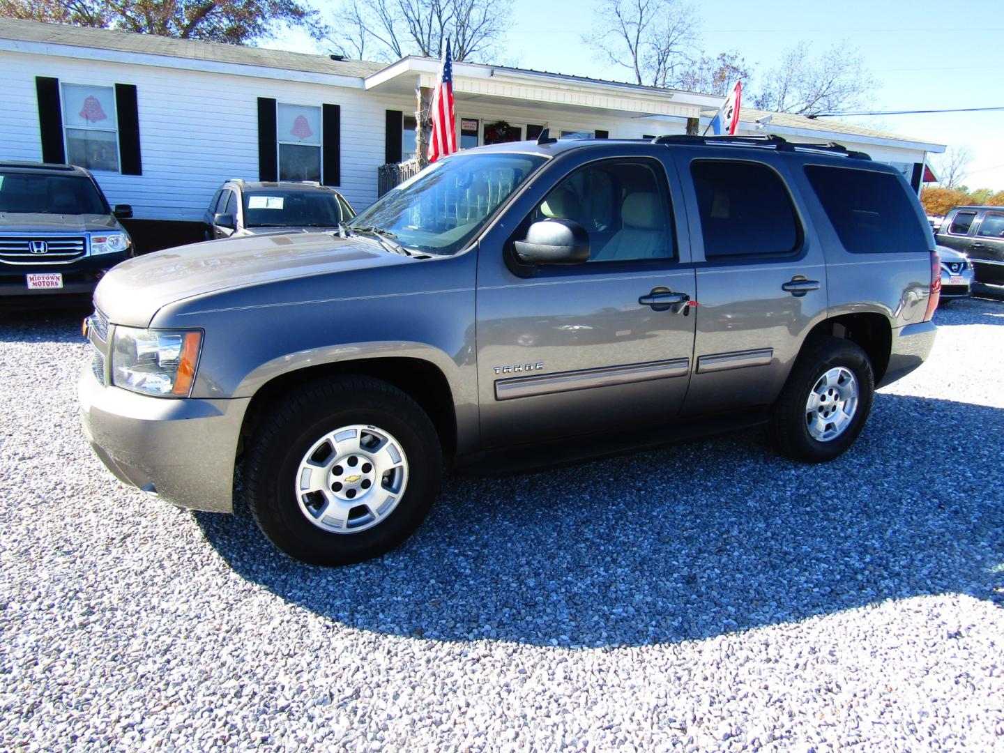 2012 Brown /Tan Chevrolet Tahoe (1GNSCAE07CR) , Automatic transmission, located at 15016 S Hwy 231, Midland City, AL, 36350, (334) 983-3001, 31.306210, -85.495277 - Photo#2